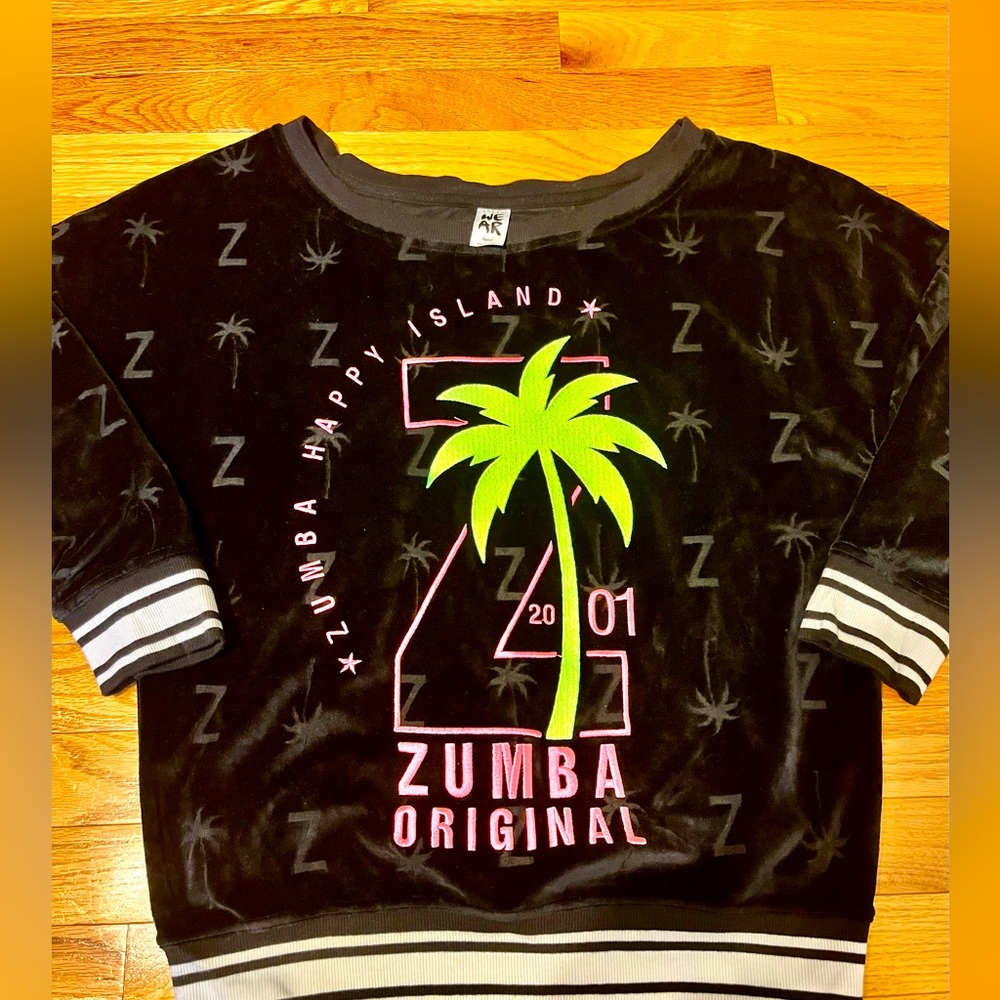 Zumba brand velour pullover with hot pink and green lettering.